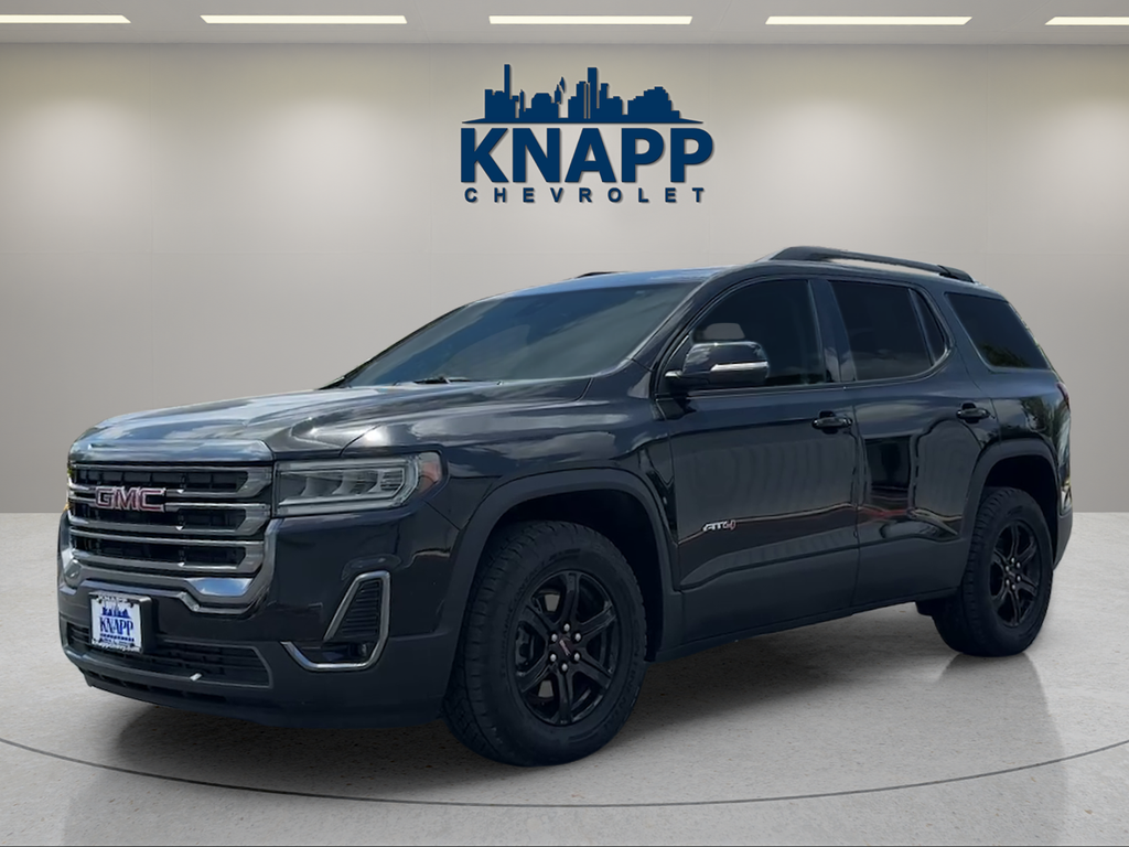 2023 GMC Acadia AT4 in Ebony Twilight Metallic — front three-quarter view