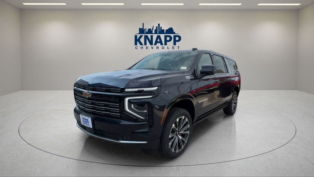 2026 Chevrolet Suburban High Country in Dark Ash Metallic — front three-quarter view