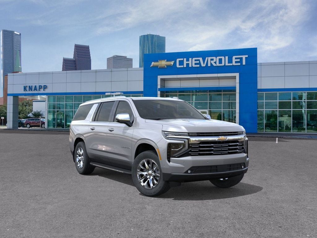 2026 Chevrolet Suburban Premier in Sterling Gray Metallic — front three-quarter view