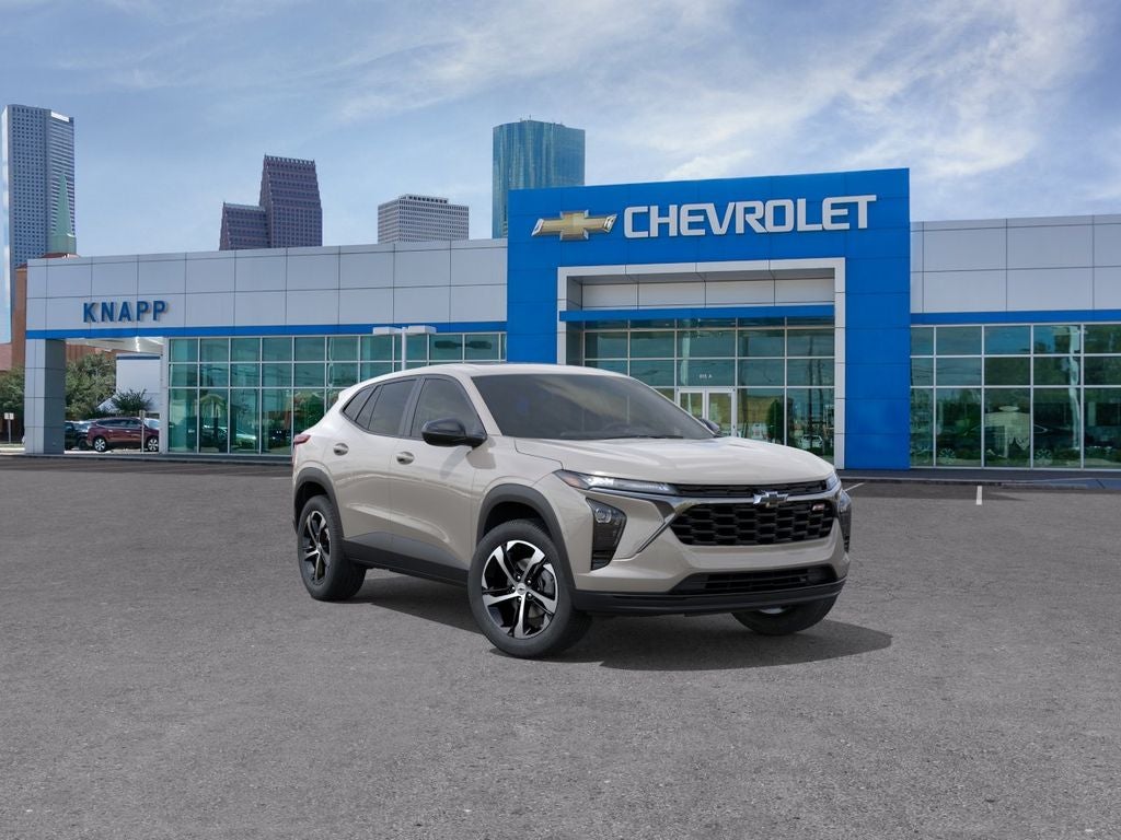 2026 Chevrolet Trax 1RS in White Sands — front three-quarter view